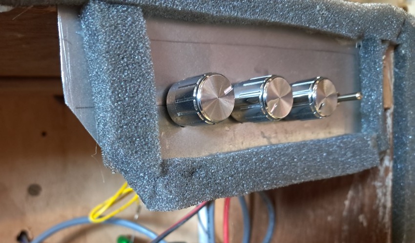 Back panel controls with sealing foam