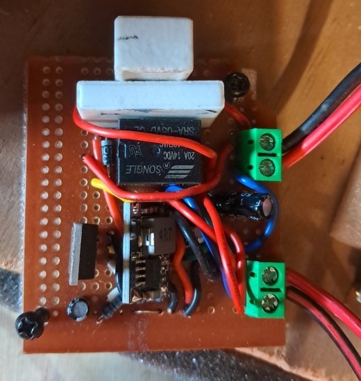 The LM7805 was eventually replaced with a more efficient buck converter